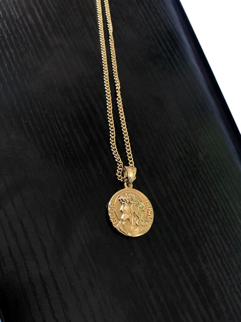 Customer photo review of Jesus quarter necklace
