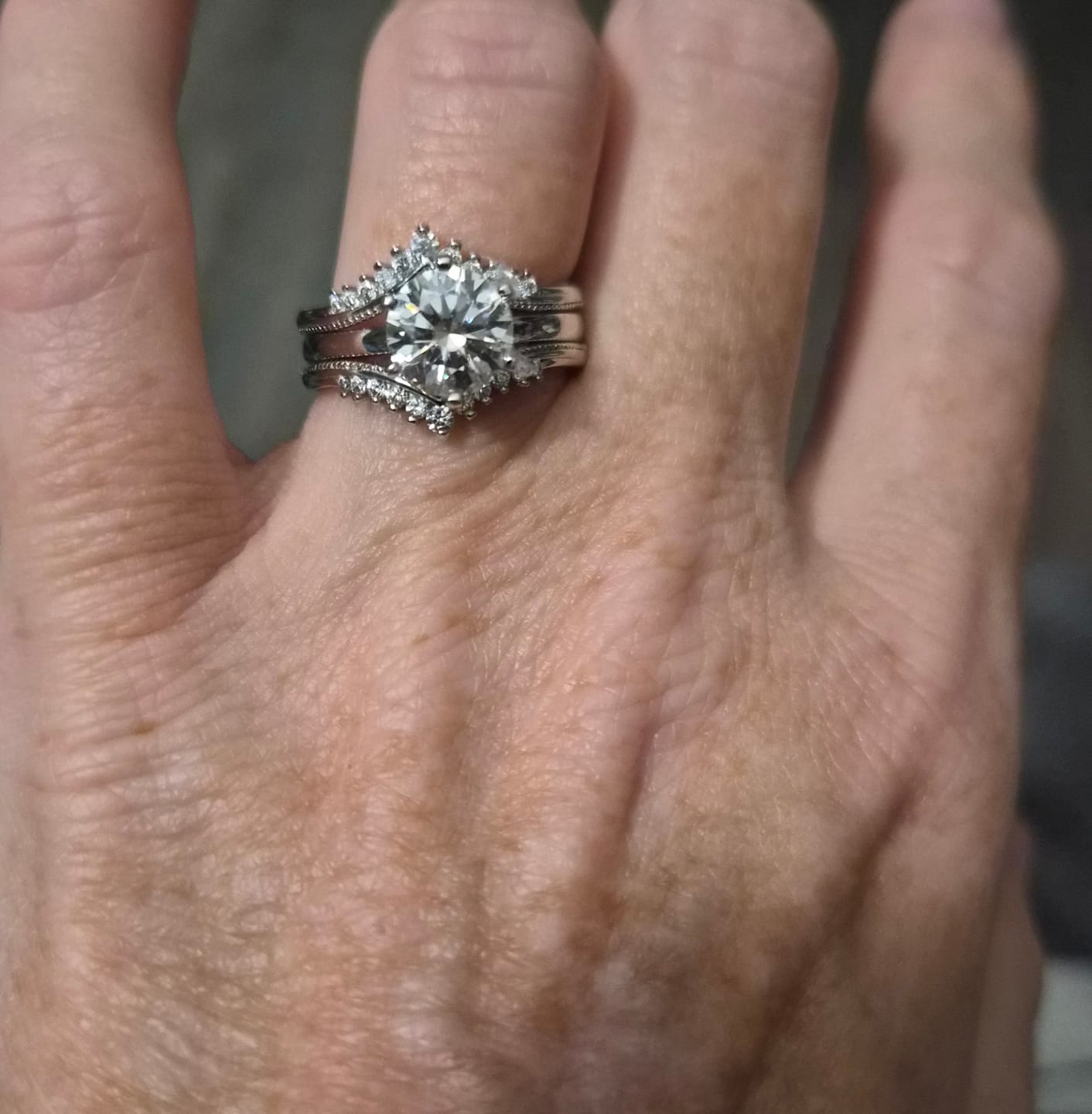 Customer photo review of Solitaire Moissanite With Enhancer Shank Bridal Engagement Ring Set