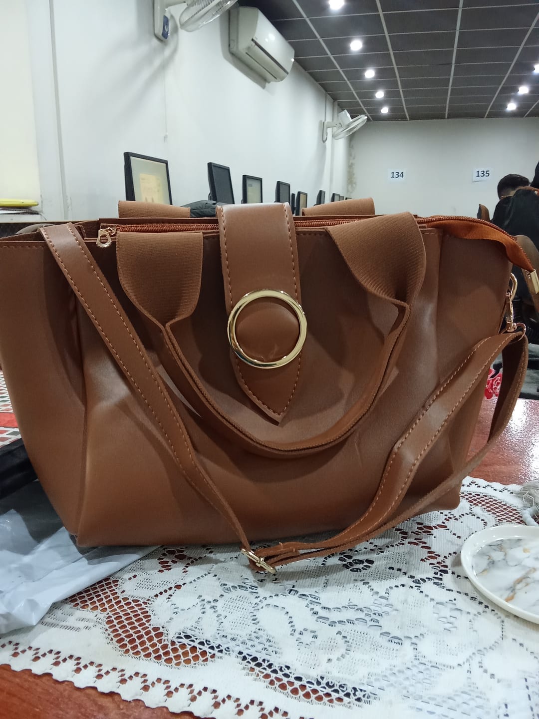 Customer photo review of Round Lock Bag - Mustard Brown