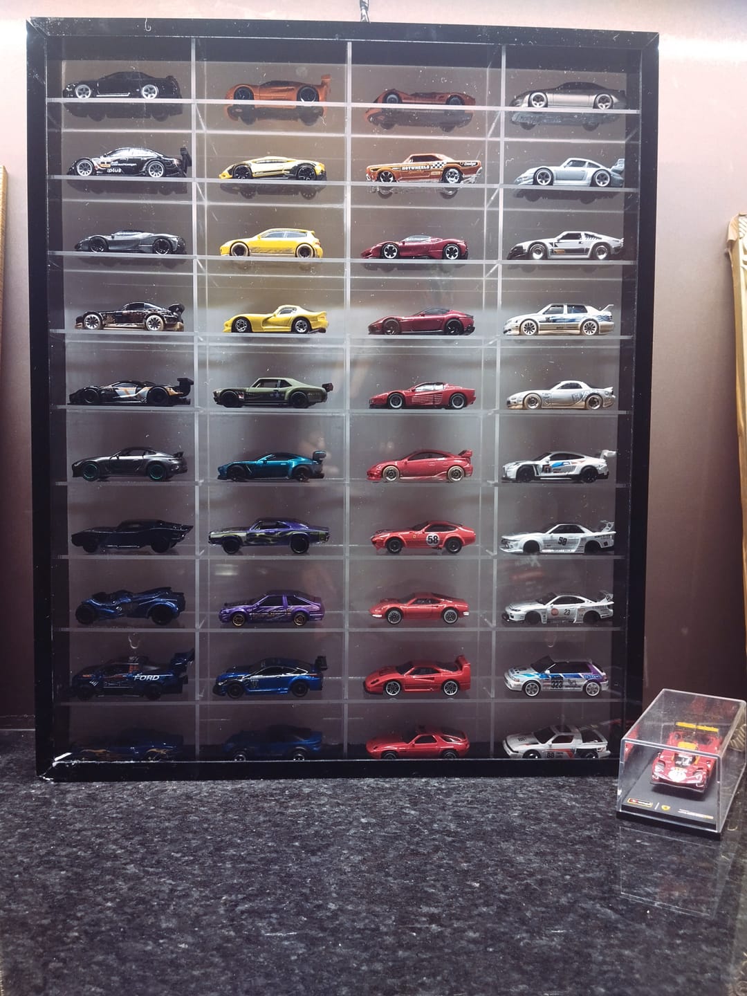 Customer photo review of Acrylic Display Case for Diecast cars 40 Car Wall Mount Shelf for 1:64 Scale Diecast Cars, Clear Dust Cover, Premium Collector Grade Showcase
