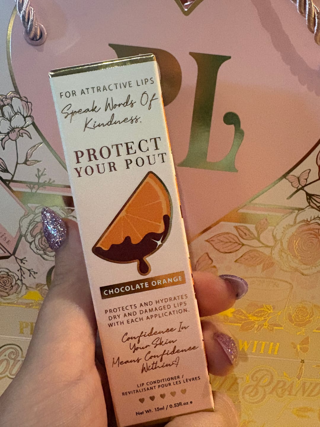 Customer photo review of Protect Your Pout Keychain Lip Conditioner