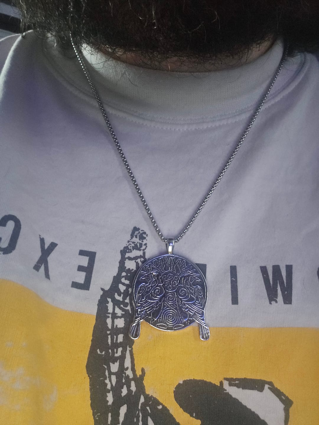 Customer photo review of Twin Raven Medallion