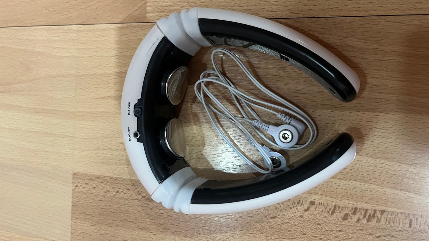 Customer photo review of Masajeador de cuello y espalda electromagnético