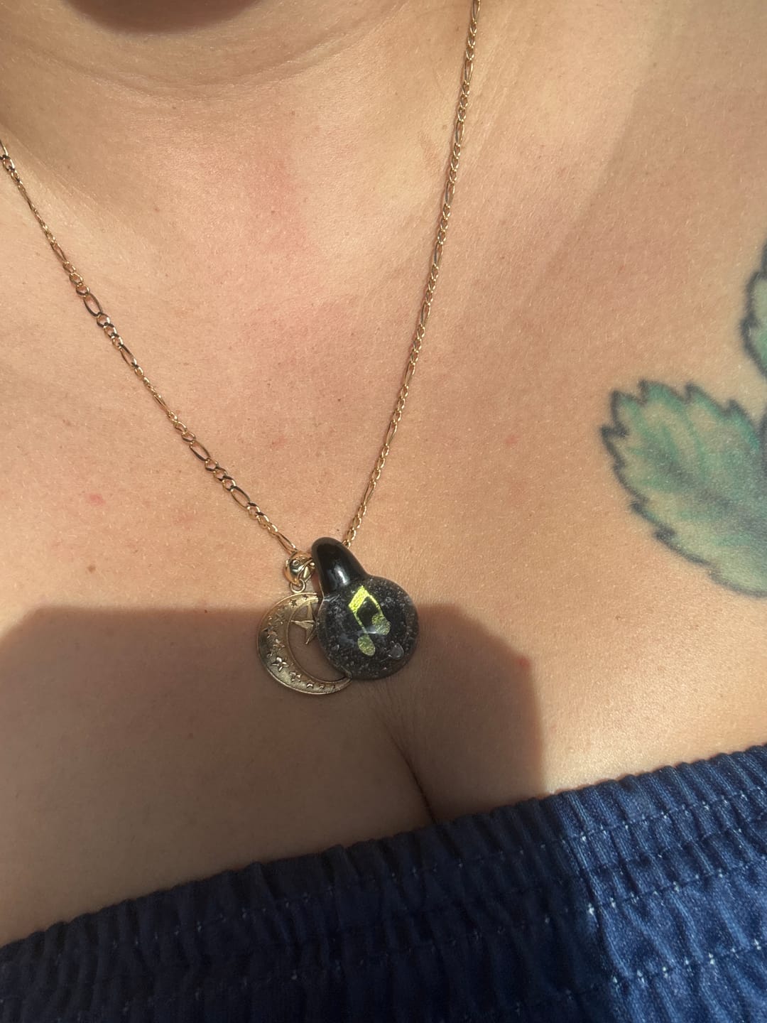 Customer photo review of Music Note Hologram Pendant with Infused Cremation Ash