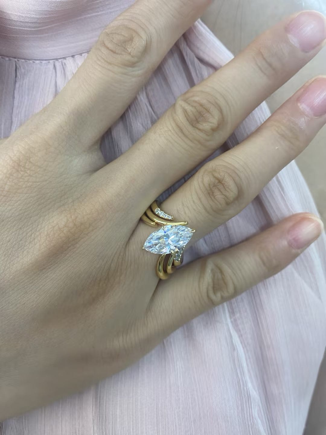 Customer photo review of S925 3PC Unique 3.0Ct Marquise Cut Engagement Ring with Open V-Shaped Pave Round Cut Accent Stones Wedding Band
