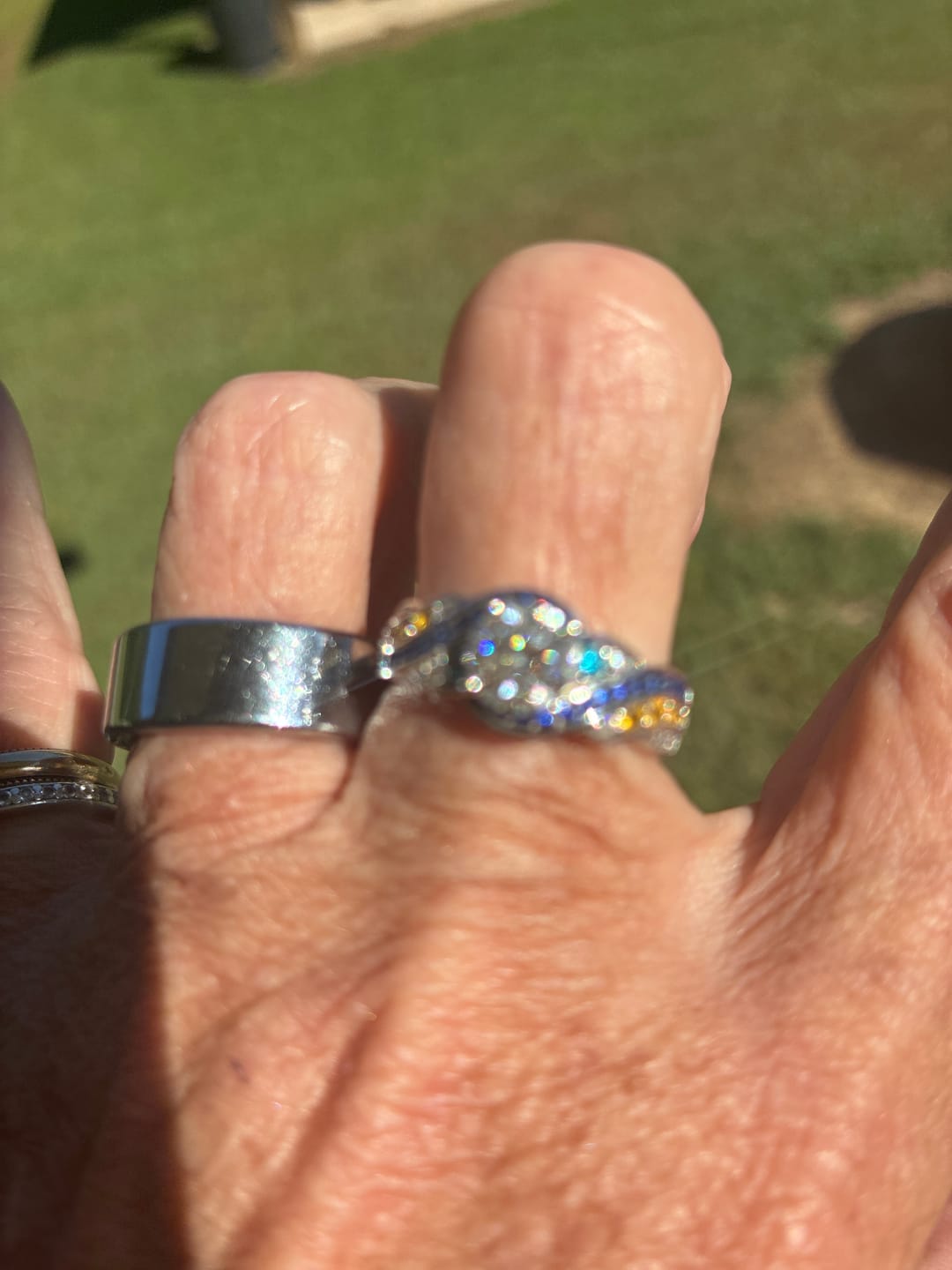 Customer photo review of Starry Night Moissanite Artistic Swirl Accent Engagement Ring