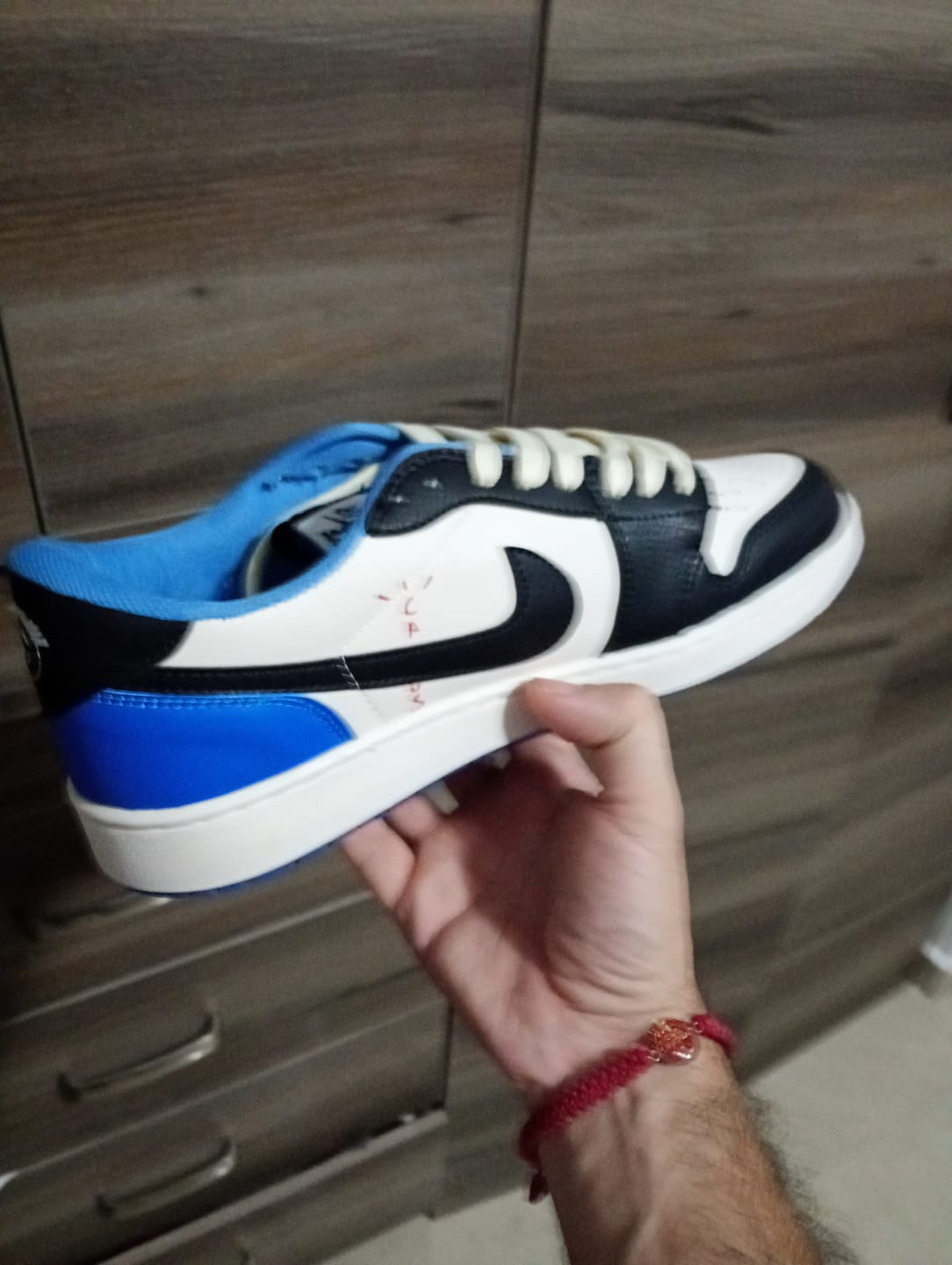 Customer photo review of Tenis Travis Low OG Fragment X
