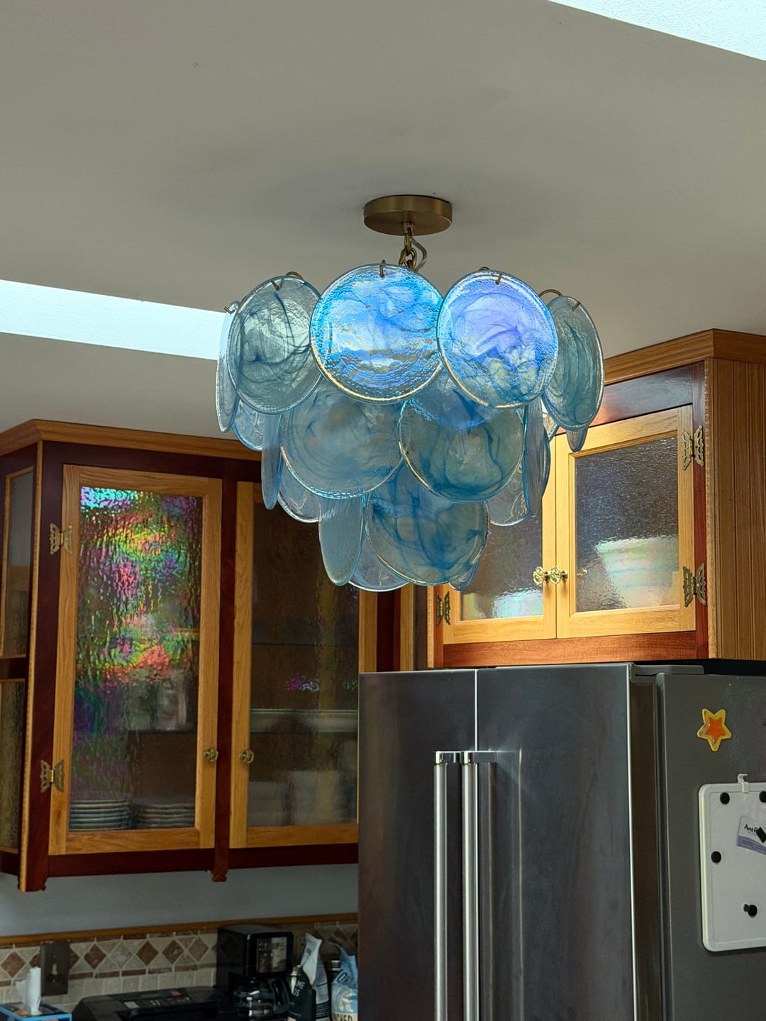 Customer photo review of Glam Blue Iridescent Swirl Glass Round Tiered Chandelier