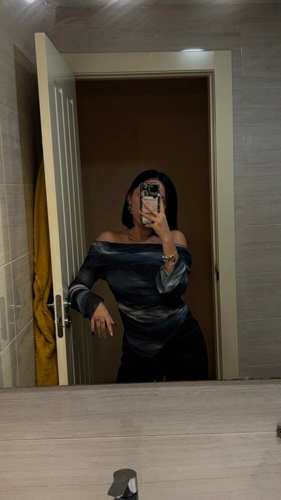 Customer photo review of Ninonine "Lyra" | Abstract Midnight Off-Shoulder Asymmetrical Top