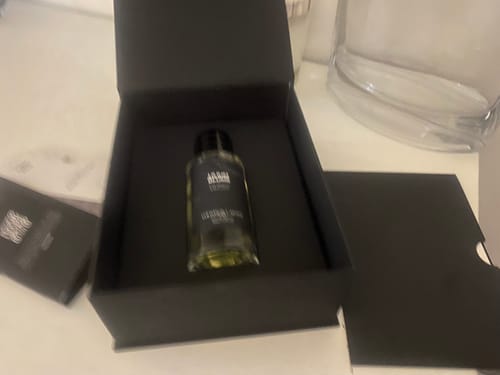 Customer's Lilium Blume Eau de Parfum bottle neatly placed inside its black presentation box.