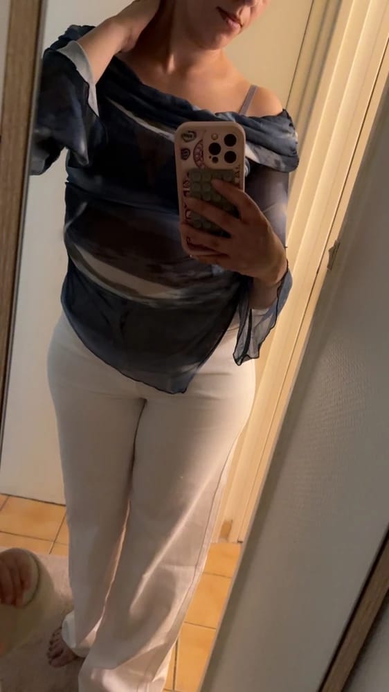 Customer photo review of Ninonine "Lyra" | Abstract Midnight Off-Shoulder Asymmetrical Top