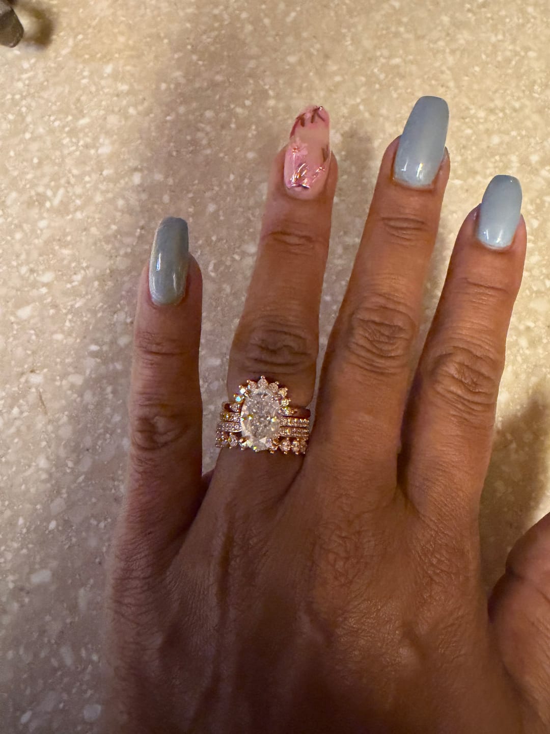 Customer photo review of Lavish Oval Cut 5.0 Ct Solitaire 4pc Crown Stacking Wedding Ring Set 925 Sterling Silver