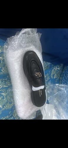 Customer photo review of Gucci leather slides
