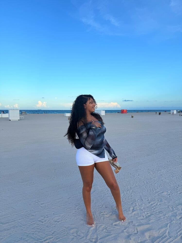 Customer photo review of Ninonine "Lyra" | Abstract Midnight Off-Shoulder Asymmetrical Top