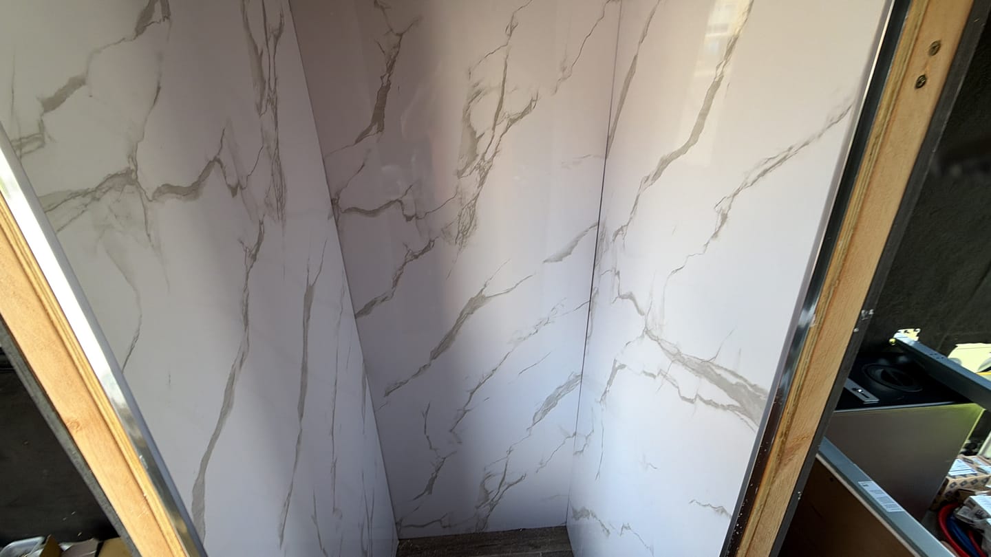 Customer photo review of Premium Carrara White Marble Gloss Shower Wall Panel - 1M x 2.4M