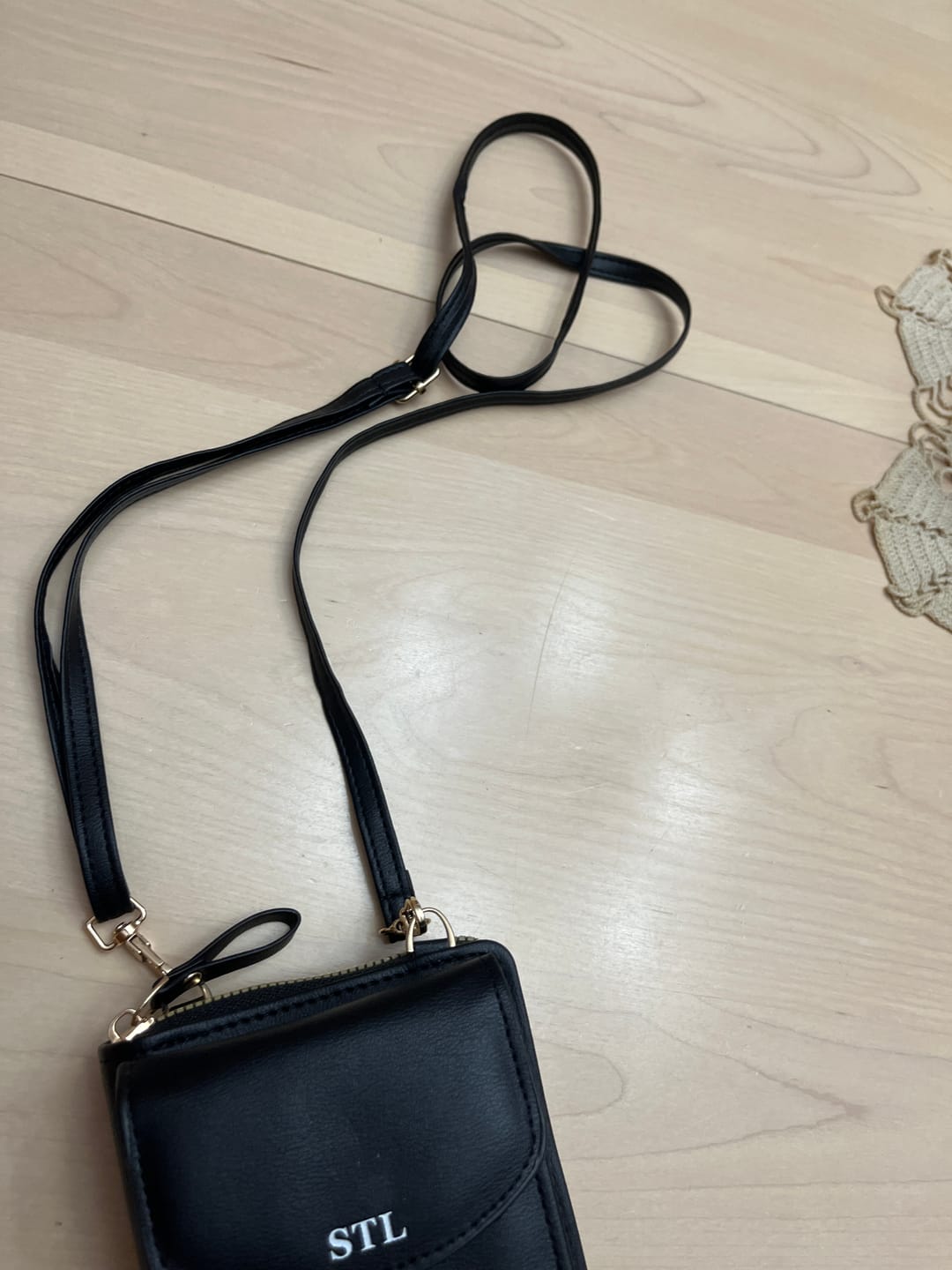 Customer photo review of The Original STL Crossbody Clutch Wallet