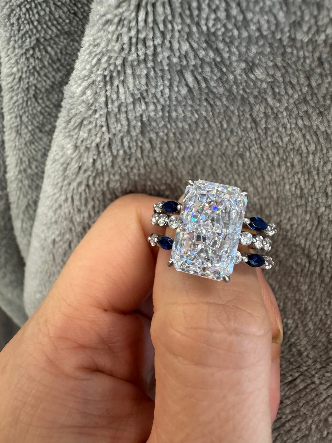 Customer photo review of S925 Elegant 5.0Ct Radiant Cut Hidden Halo Stckable Enhancer Ring Sets in Sterling Silver