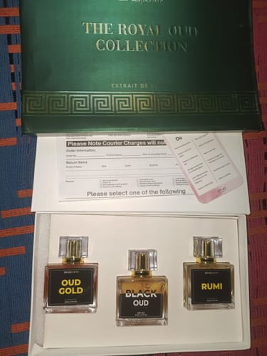 Customer's The Royal Oud Collection box, opened to reveal three glass perfume bottles labelled Oud Gold, Black Oud, Rumi.