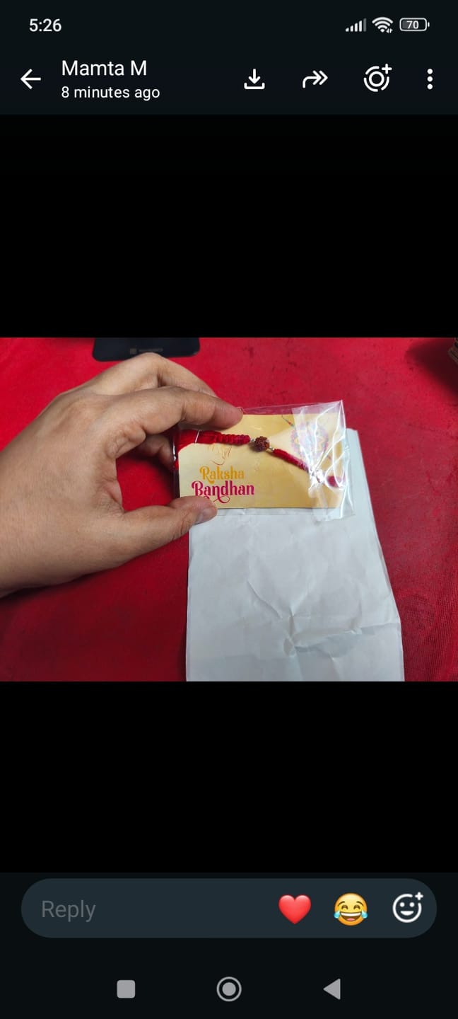 Customer photo review of Silver Rakhi for Brother Rudraksha & Bud Accents