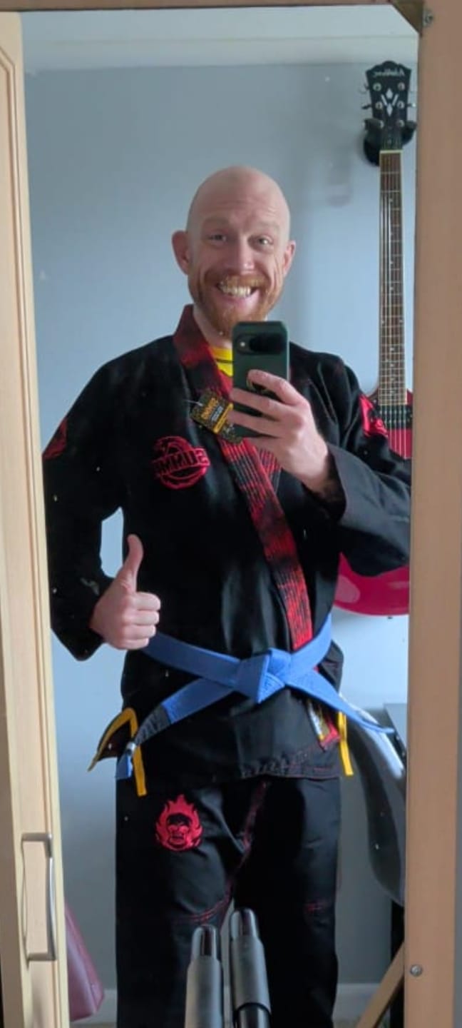 Customer photo review of Fiery Skull Flame Lapel Rash Guard lining Jiu Jitsu (BJJ GI)