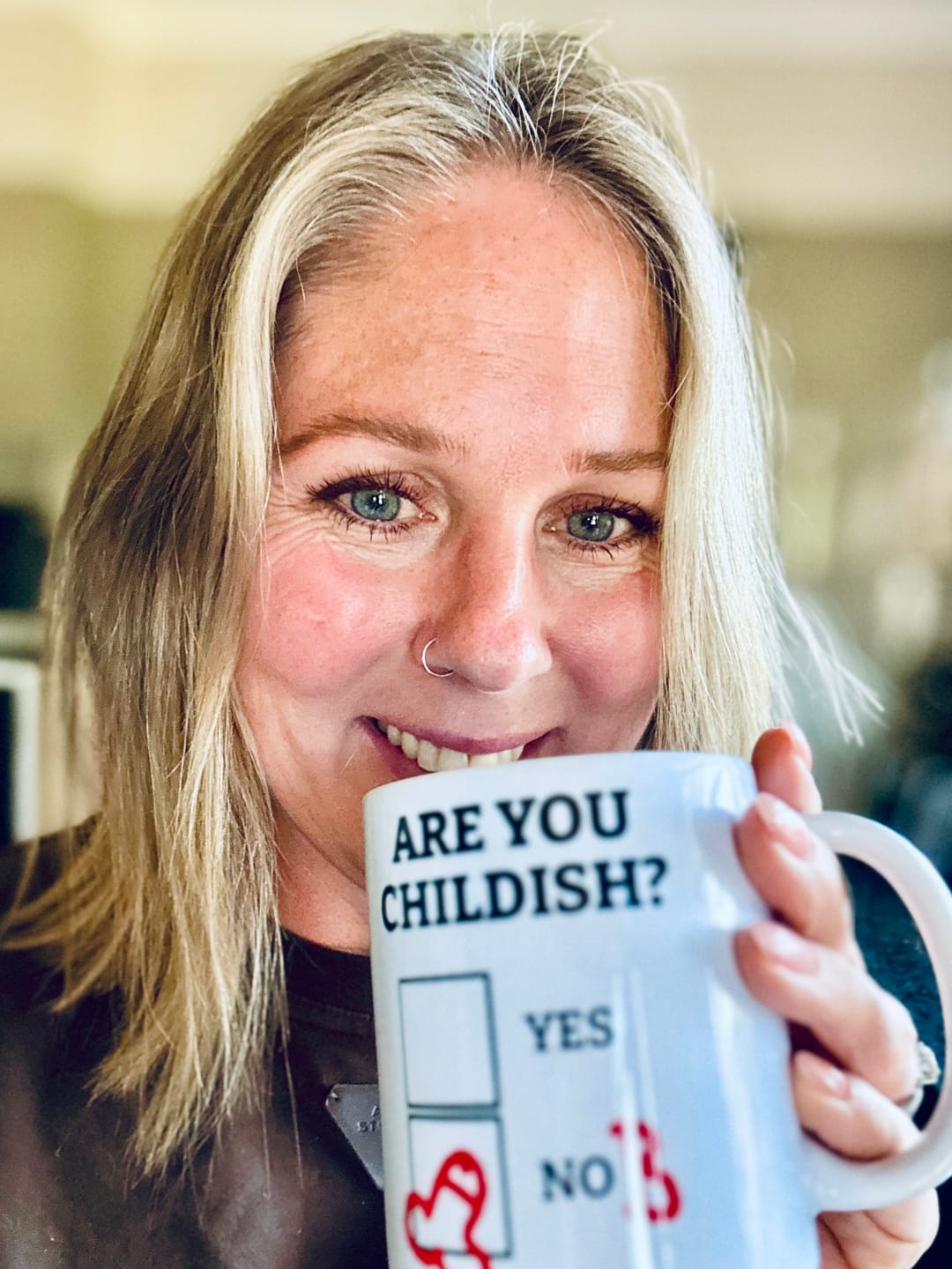 Customer photo review of Definitely Not Childish 📋🖕 - Coffee Mug