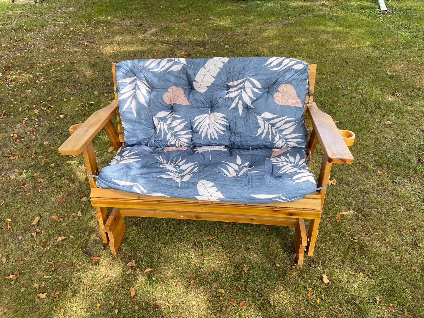 Customer photo review of Homrest Wooden Patio Glider Bench with Cup Holders Heavy Duty 900lbs