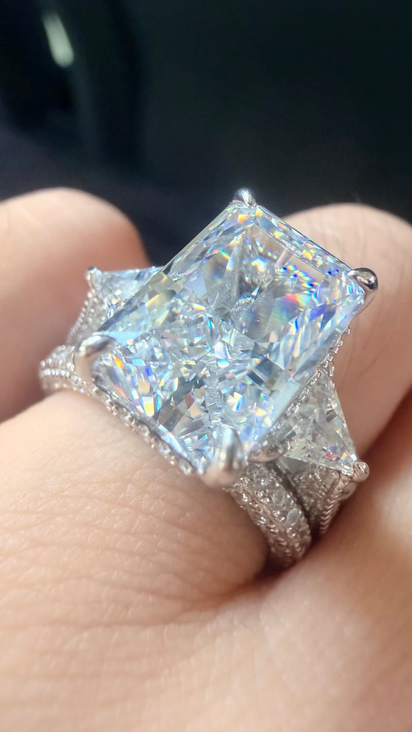 Customer photo review of S925 3PC Hidden Halo 5.0Ct Radiant Cut Three Stone Stackable Statement Ring Sets