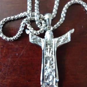 Customer photo review of Jesus Christ Savior Cross Necklace