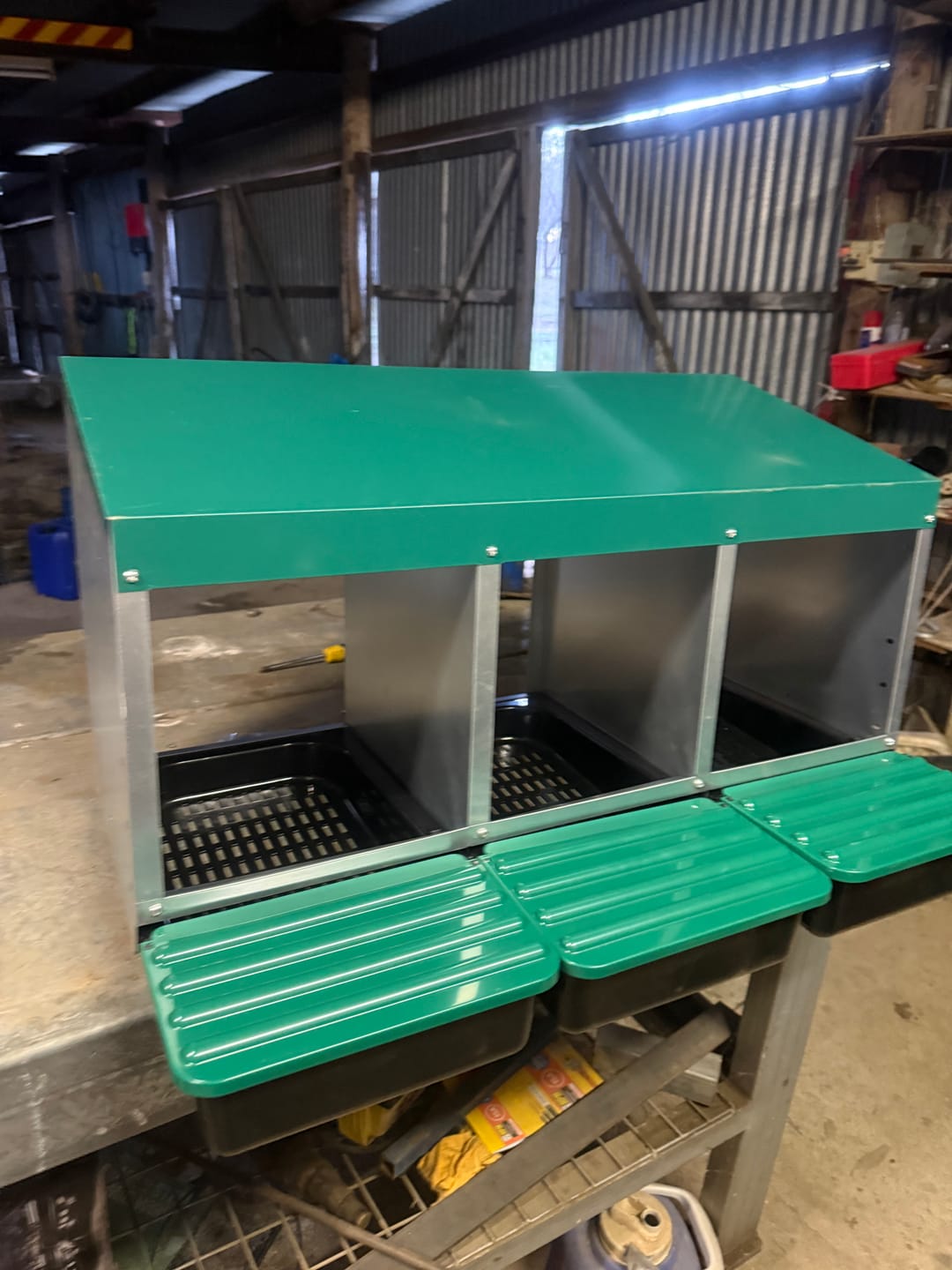 Customer photo review of Elevated Chicken Laying Nest Box Roll Away 3-Hole Green