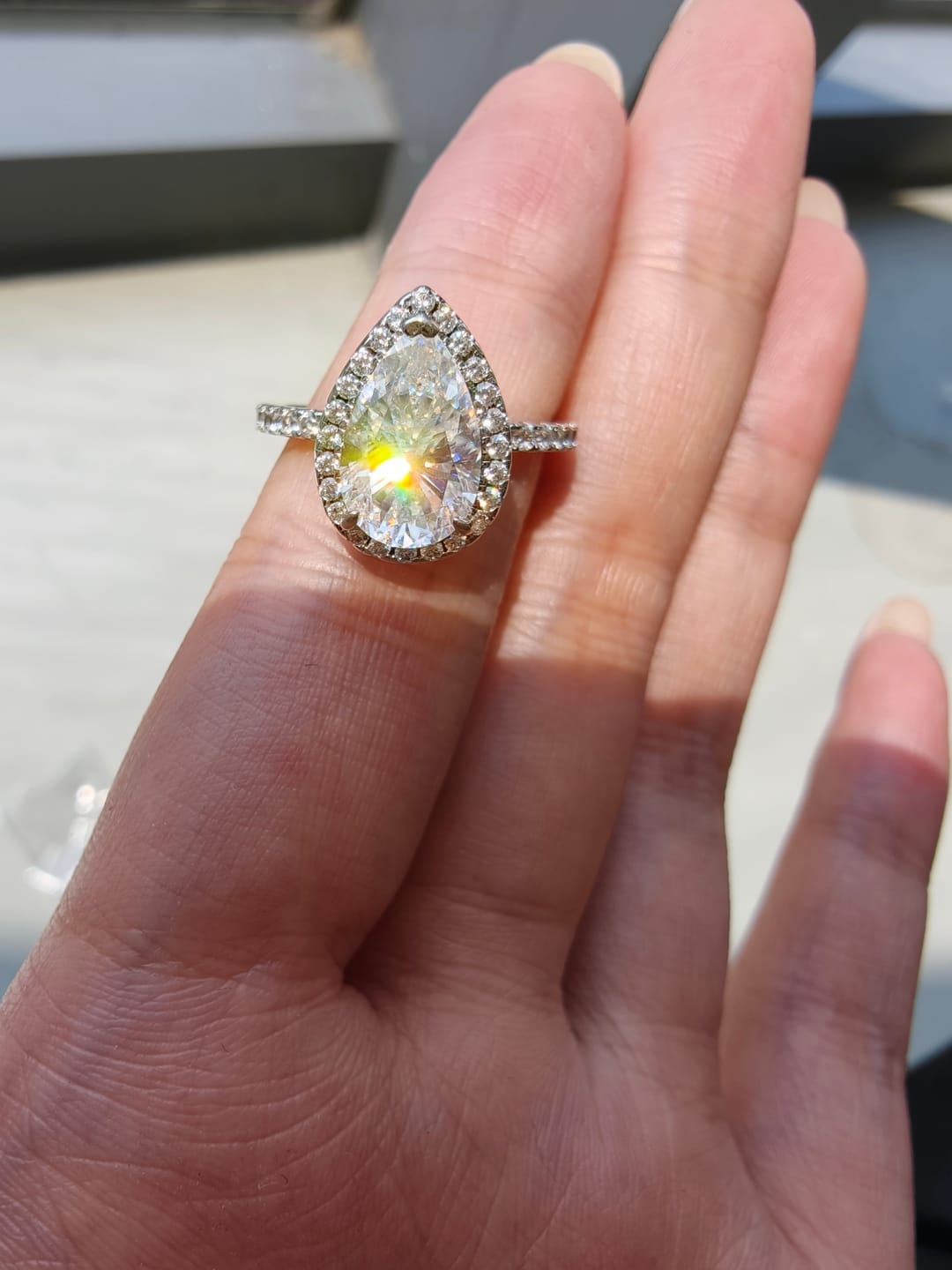 Customer photo review of Rodiffy Moissanite 2.5 Ct Pear Cut Halo Engagement Ring For Women