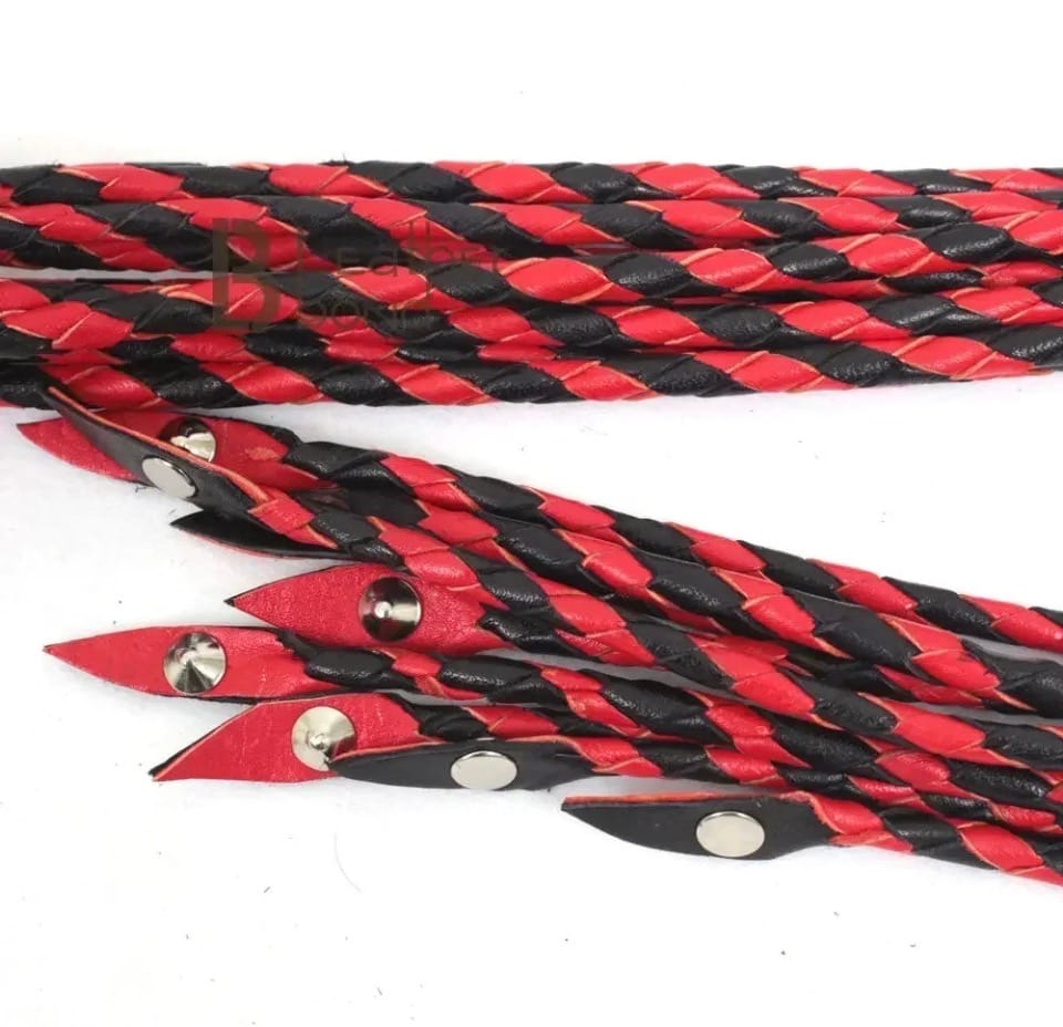 Customer photo review of Real Genuine Cowhide Leather Flogger | Red and Black Cat O Nine Braided Falls | Heavy Steel Studs Leather Bond