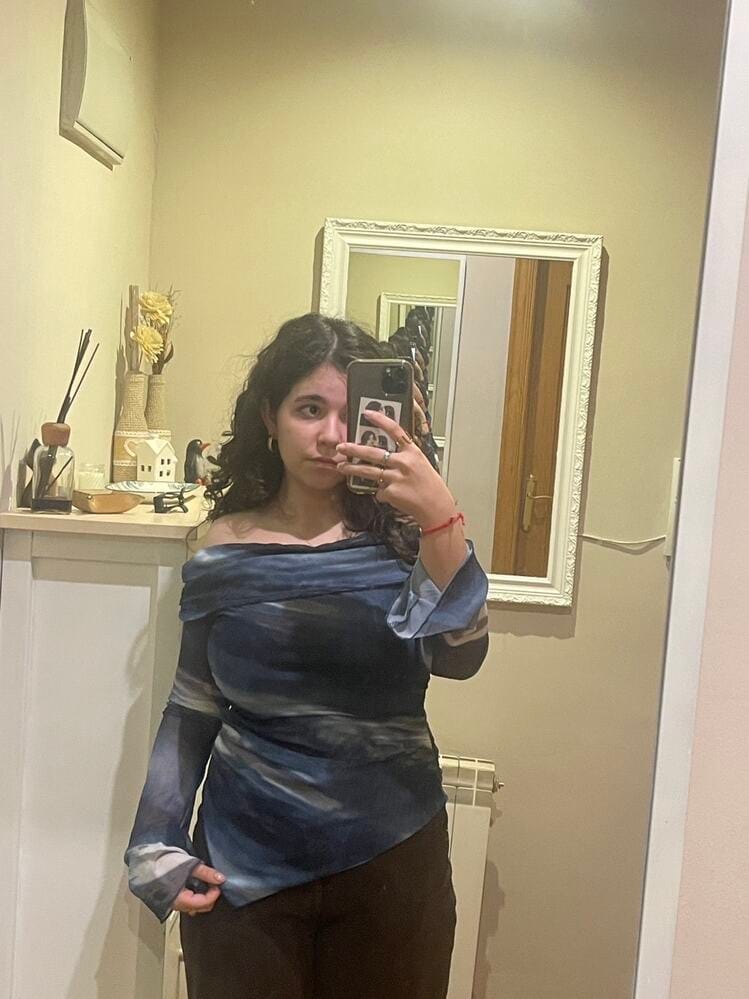 Customer photo review of Ninonine "Lyra" | Abstract Midnight Off-Shoulder Asymmetrical Top