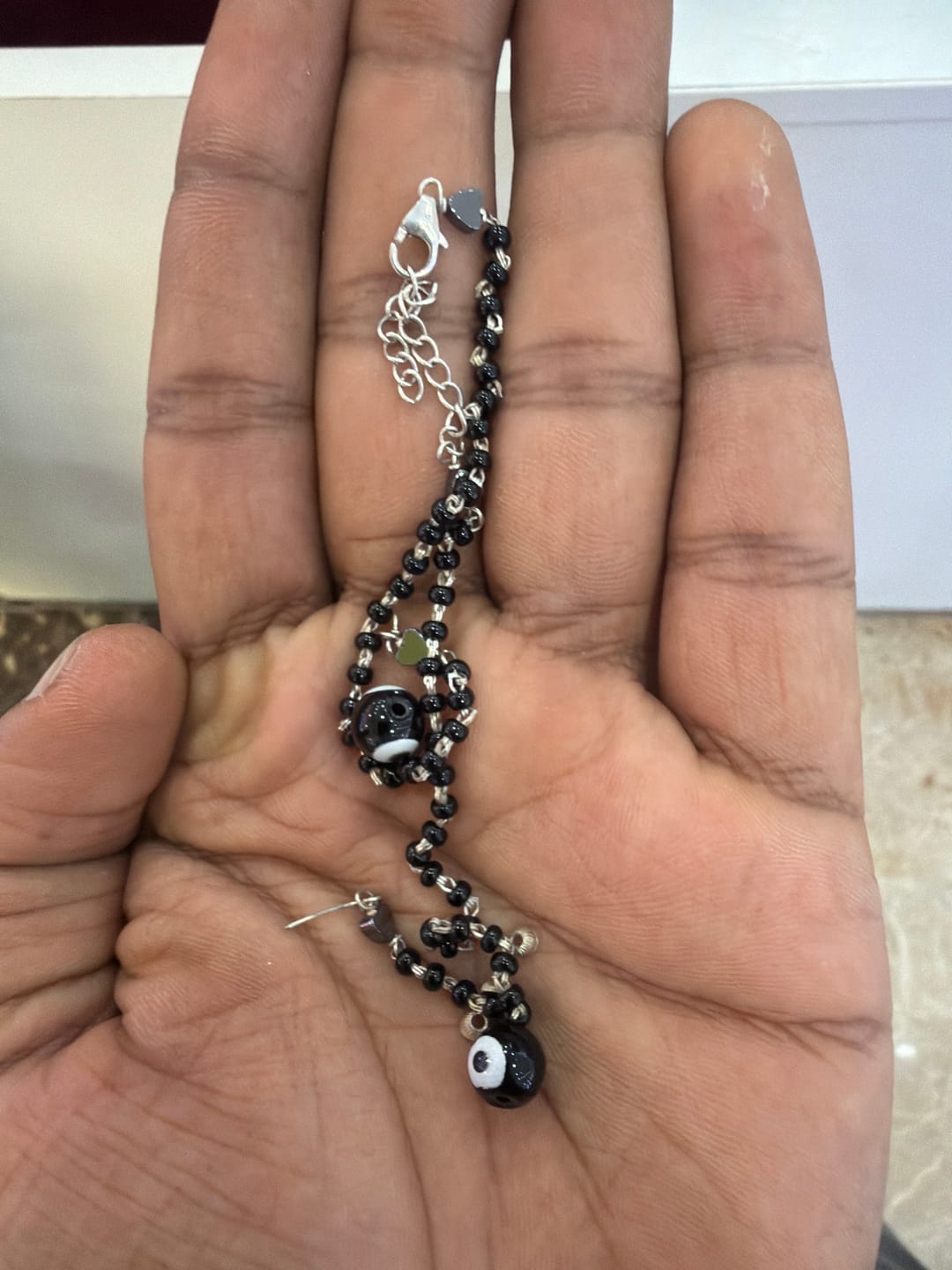 Customer photo review of Silver Black Evil Eye Anklet