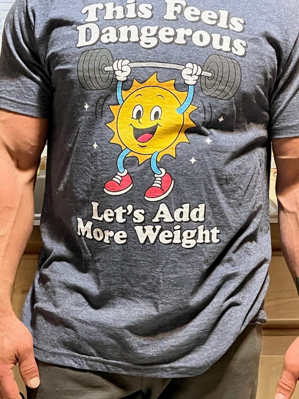 Customer photo review of This Feels Dangerous T-Shirt