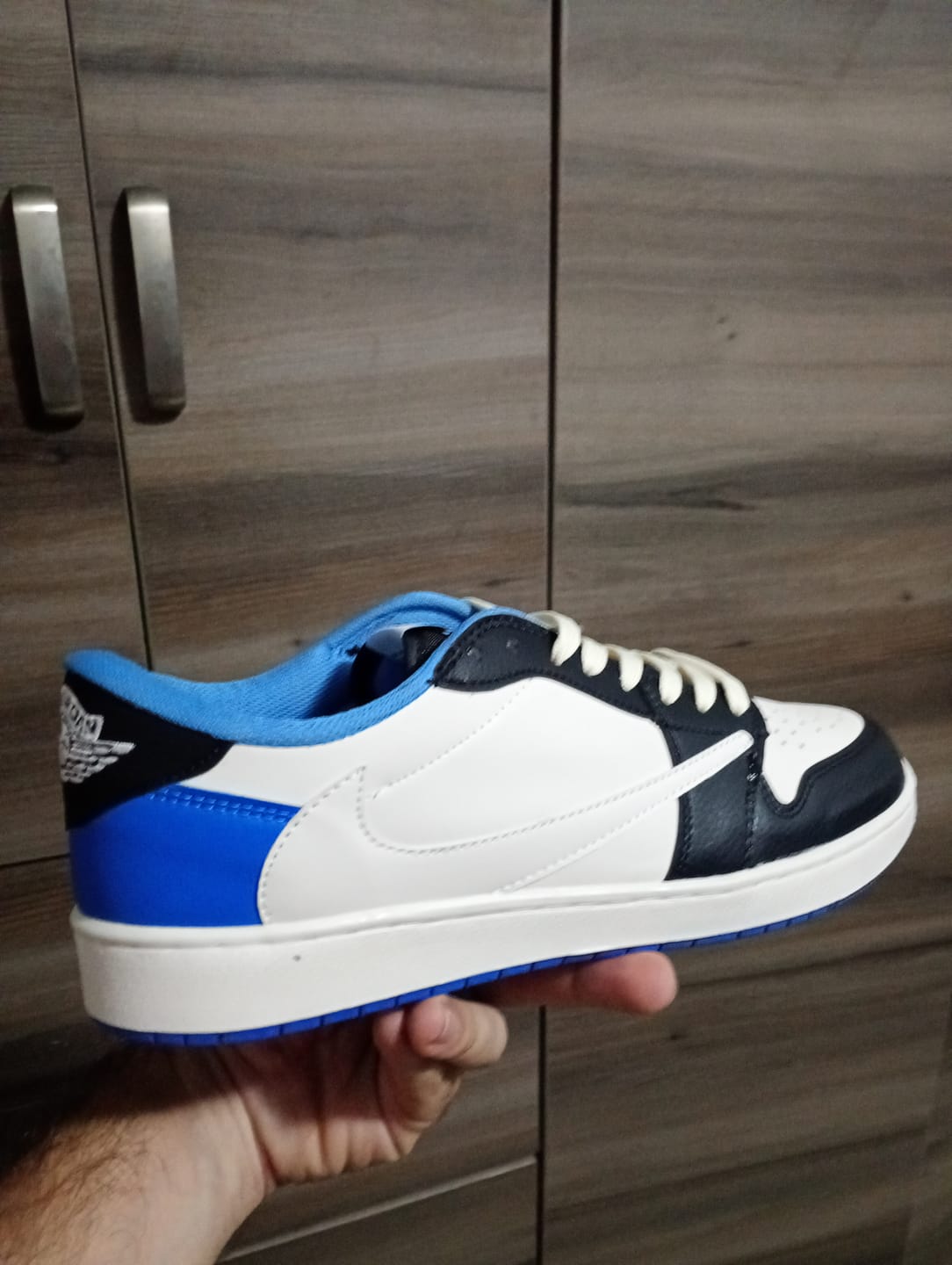 Customer photo review of Tenis Travis Low OG Fragment X