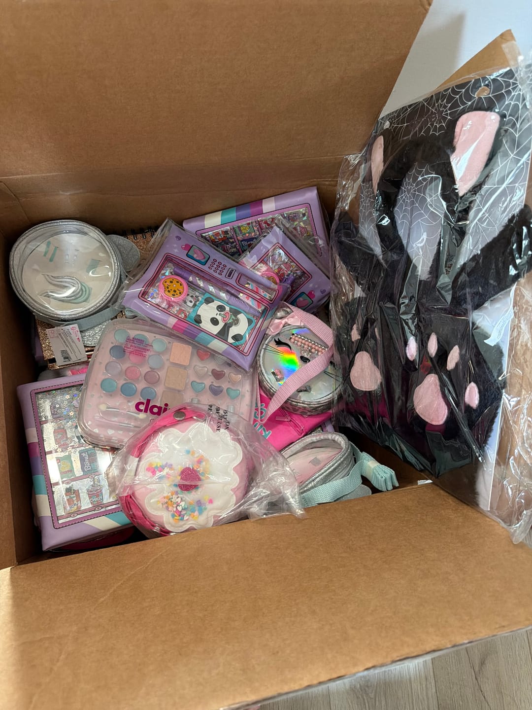 Customer photo review of Claire's Assorted Bags, Makeup, Notebooks And More (110 Pcs Lot)