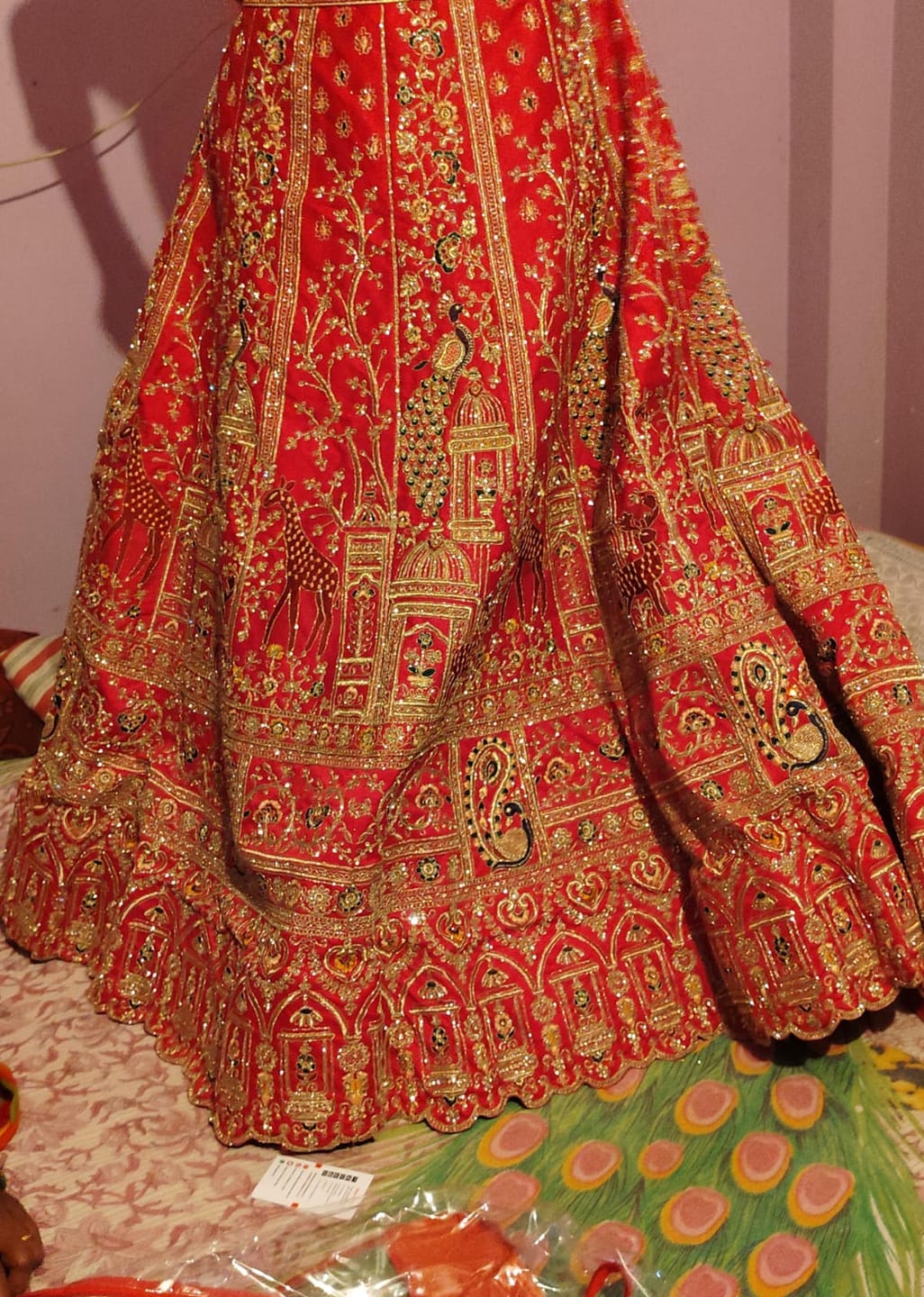 Customer photo review of Cherry Red Premium Silk Zarkan Diamond Work Bridal Lehenga Choli