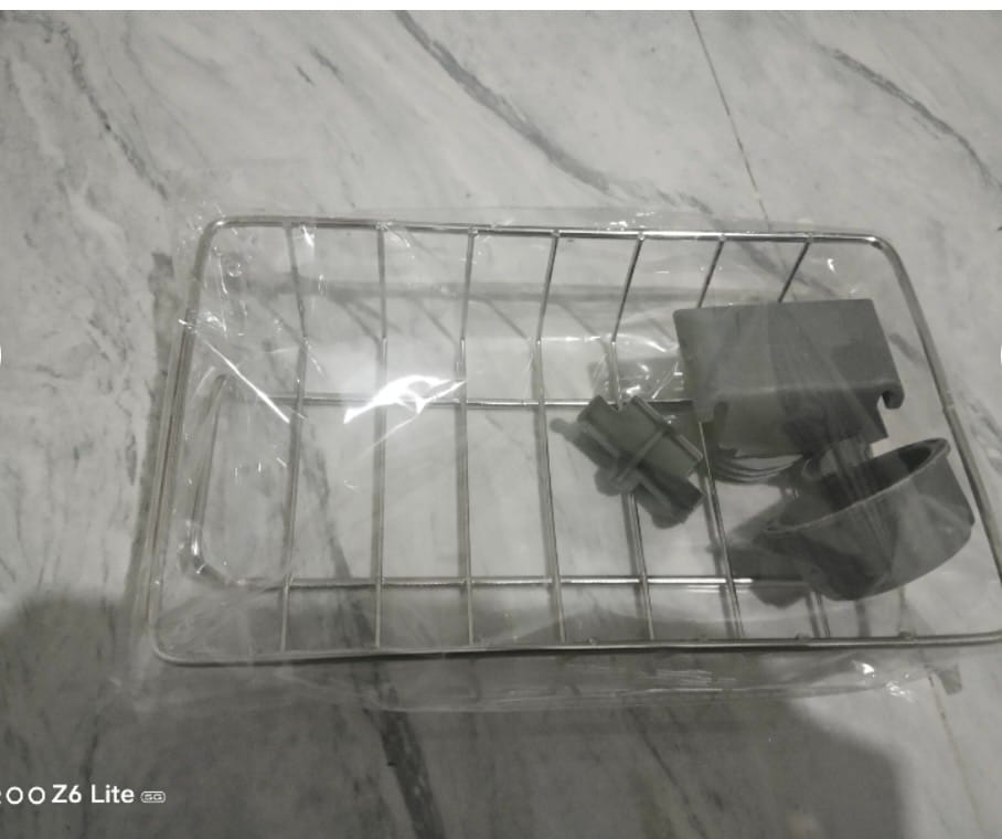 Customer photo review of Stainless Steel Sink Organizer Rack – Faucet-Mounted Kitchen Sponge Holder with Drainage