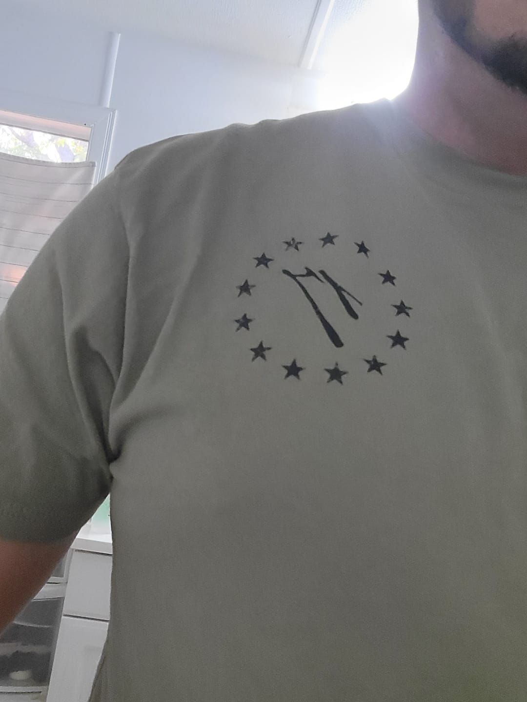 Customer photo review of GUNS OF UNITY TEE