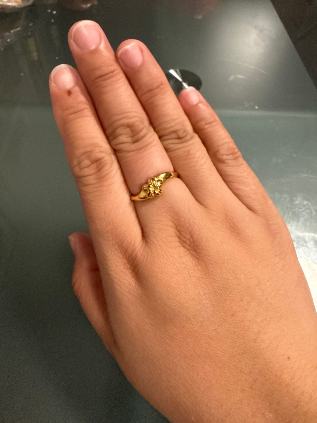 Customer photo review of Cowrie Plumeria Ring