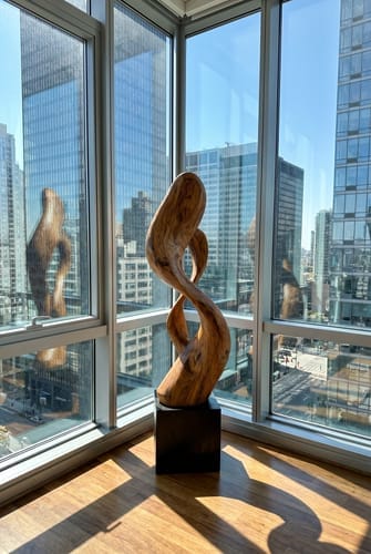 Customer photo review of Abstract Wood Sculpture With Twisted Embrace Form