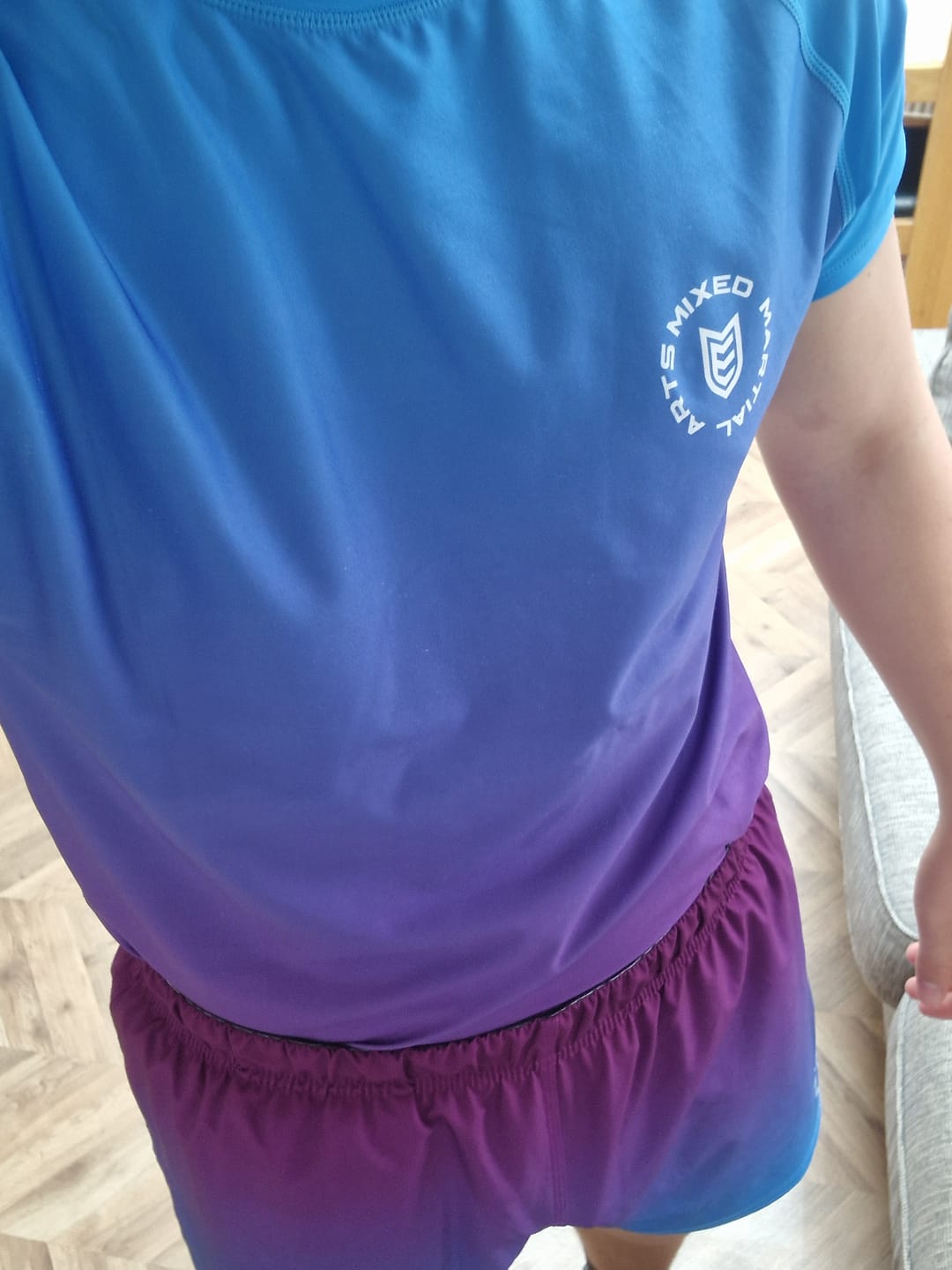 Customer photo review of Eryx Blue Gradient Hybrid MMA Shorts