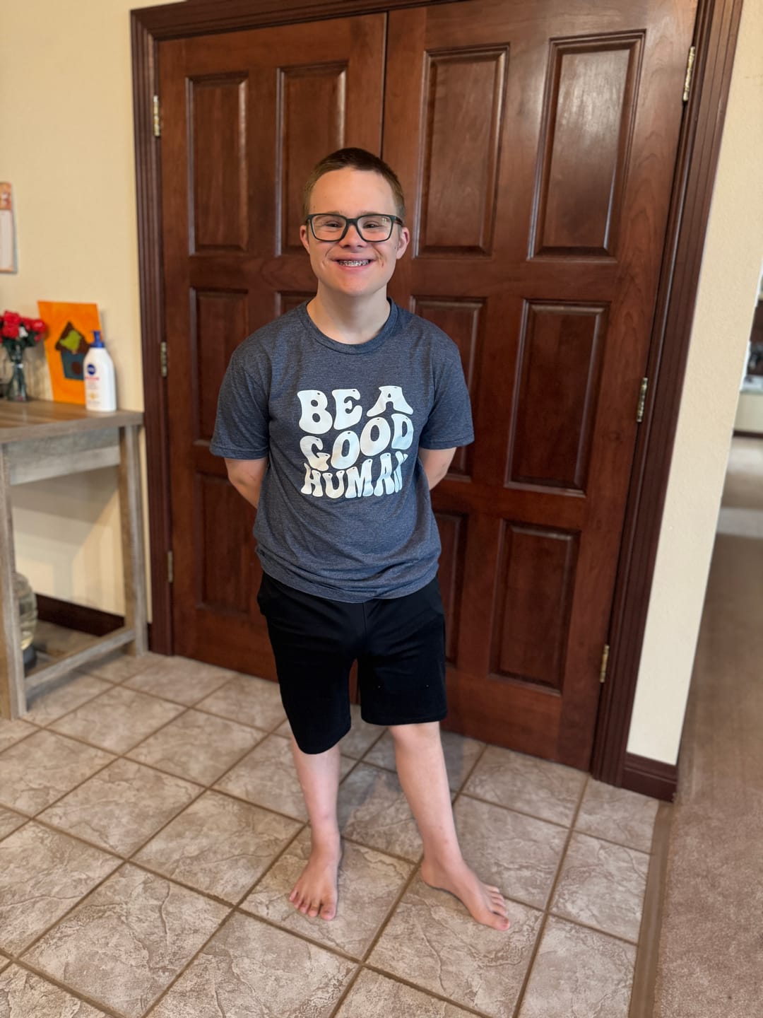 Customer photo review of Be A Good Human Groovy White Print Tee