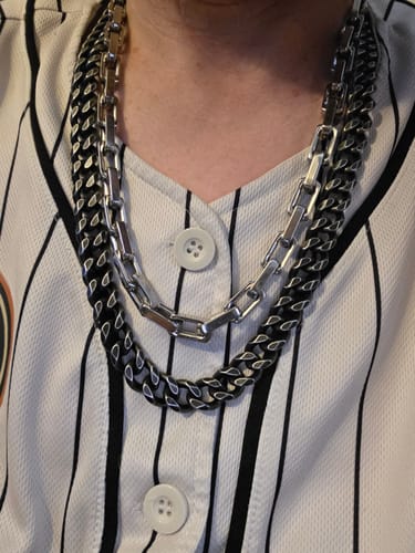 Customer's R.E.D. Silver Necklace worn layered over a striped shirt