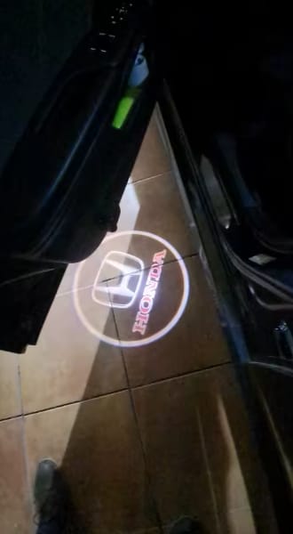 Customer photo review of Proyector Led Logo Personalizado 2 Piezas
