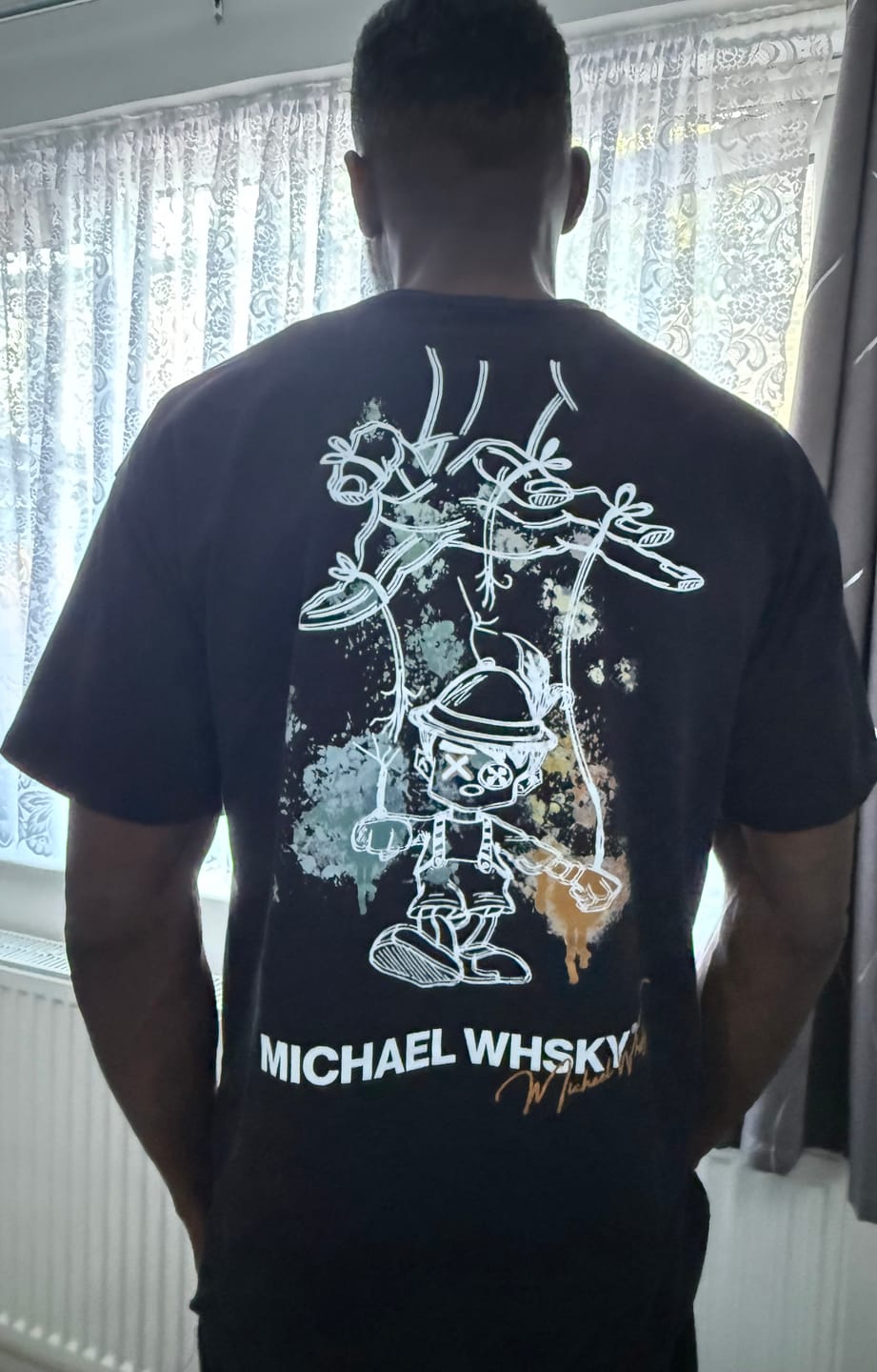 Customer photo review of Puppet State Limited Edition T-Shirt