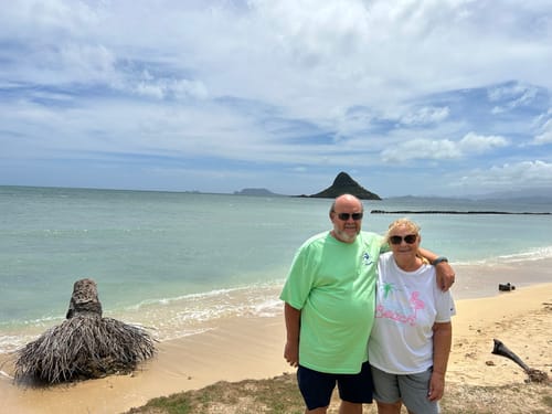 Reviewer standing on a beach with the ocean in the background, not showing the Everblog FridgeCal Calendar.