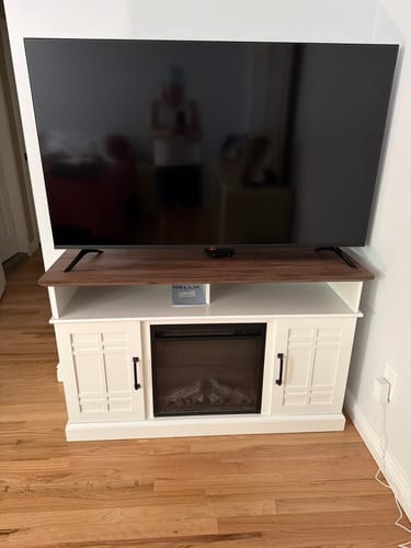 Customer photo review of Norrell 48" Wood Grid Door Farmhouse Fireplace TV Stand