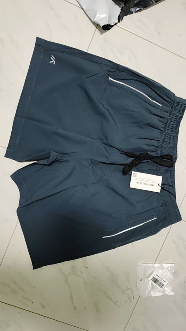 Customer photo review of Dri-Fit Ultra Cooling Sports Shorts With Zippered Pockets