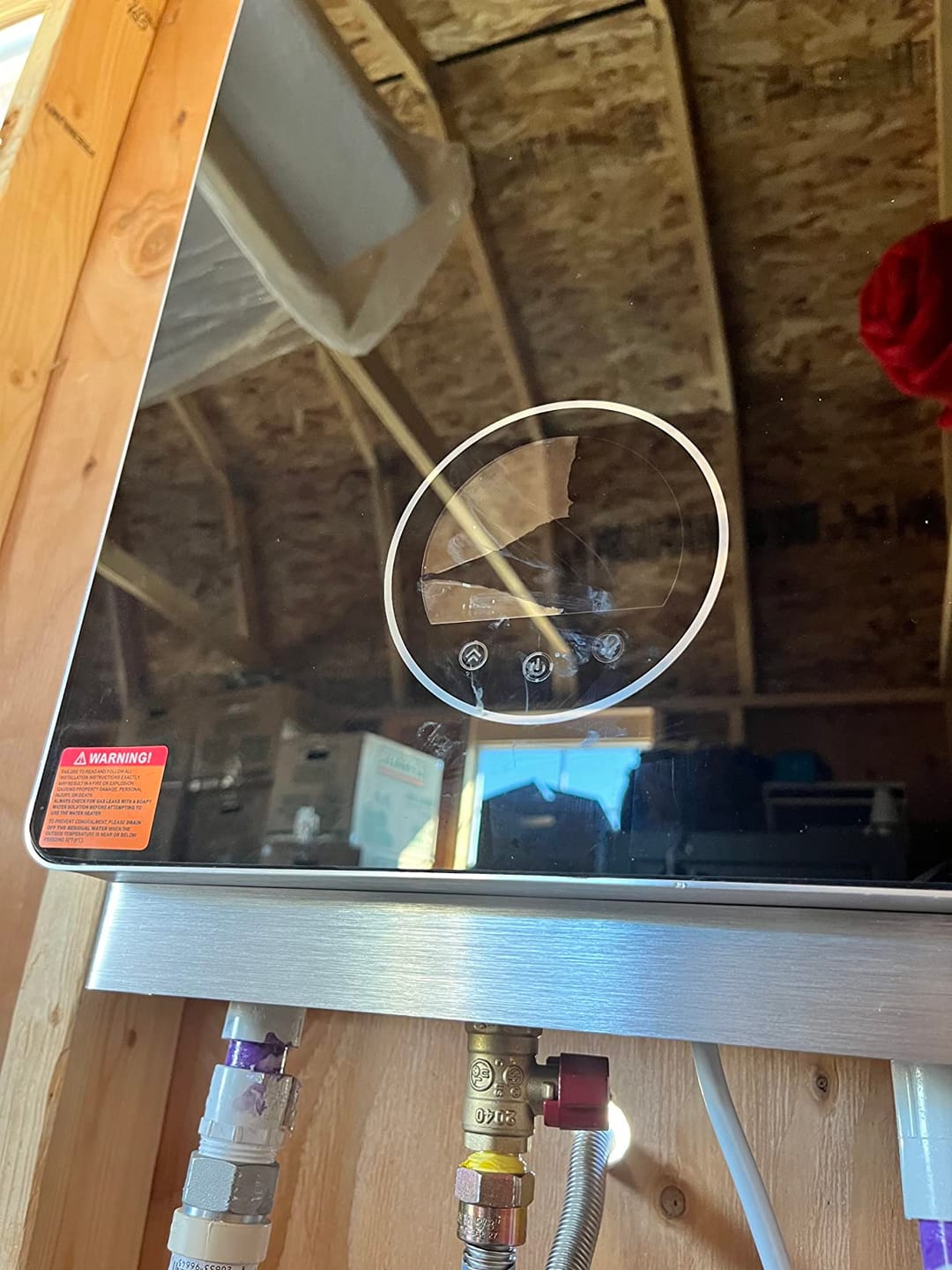 Customer photo review of 3.18 GPM Indoor Tankless Water Heater Propane with Wall Thimble, Black